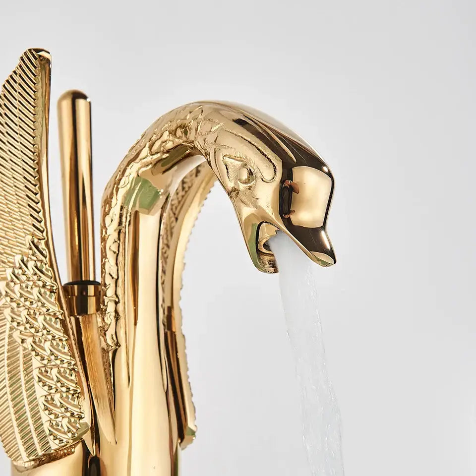 Elegant golden swan faucet bathroom hot and cold mixer tap