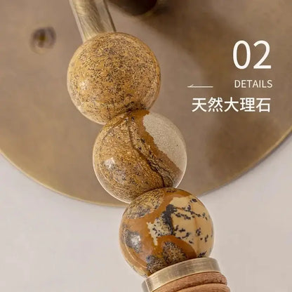 Elegant marble copper wall lamp with brass beads for living room