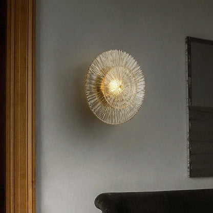 Elegant ribbed glass and gold wall sconces for living room