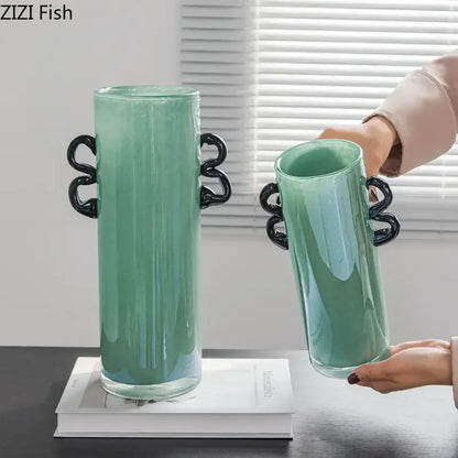 Emerald green glass vase with black handles living room decor