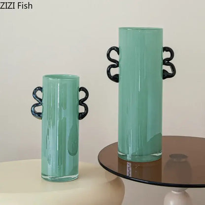 Emerald green glass vase with black handles living room decor