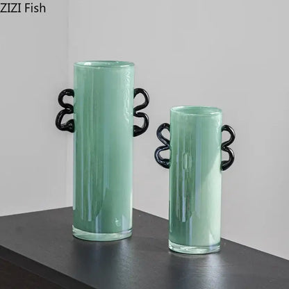 Emerald green glass vase with black handles living room decor