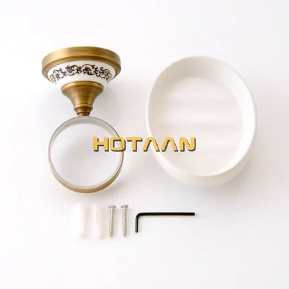 Floral brass soap holder with white ceramic dish bathroom accessory
