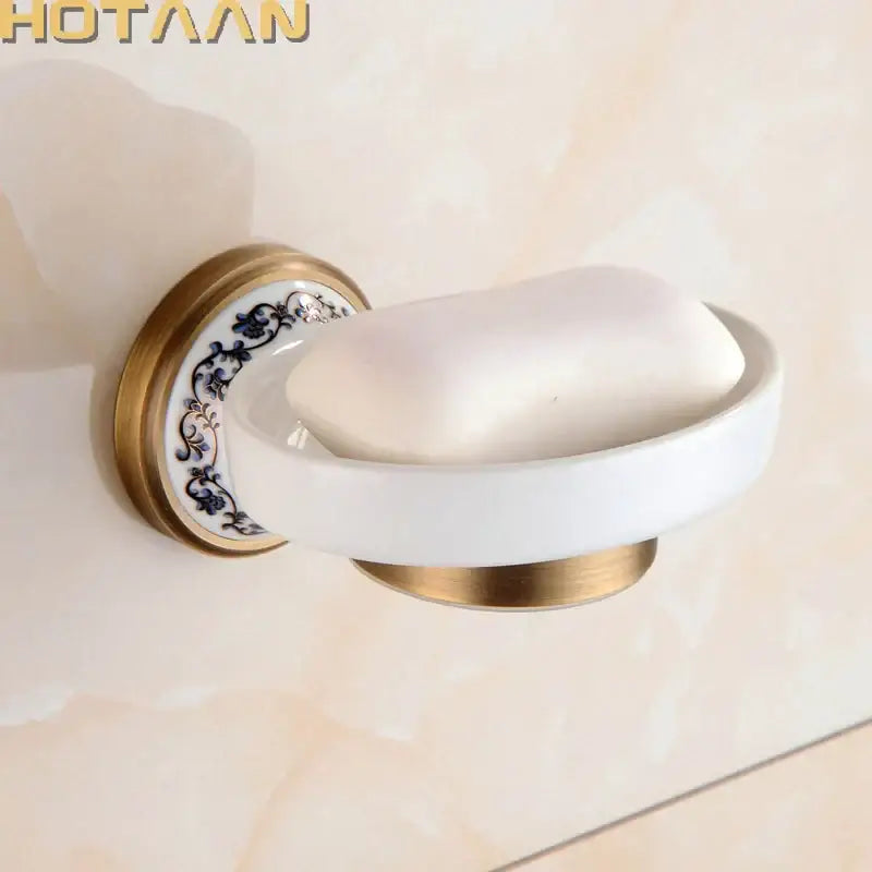 Floral brass soap holder with white ceramic dish bathroom accessory