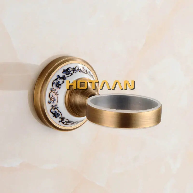 Floral brass soap holder with white ceramic dish bathroom accessory