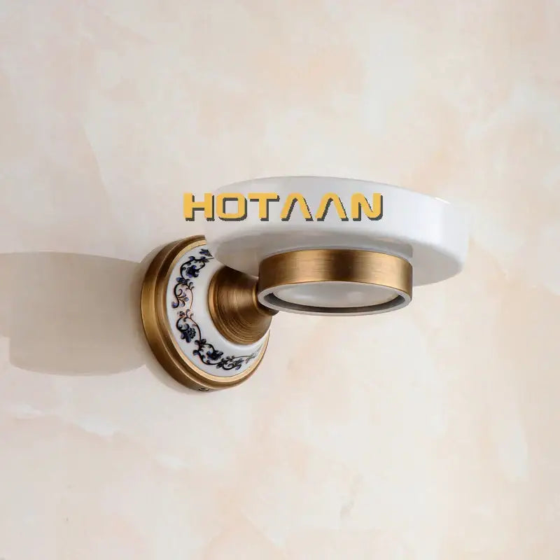 Floral brass soap holder with white ceramic dish bathroom accessory