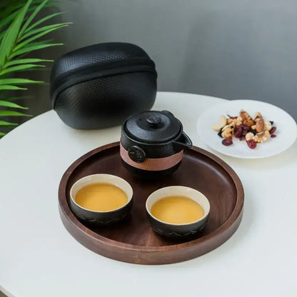 Floral embossed black pottery tea set with travel bag dining room