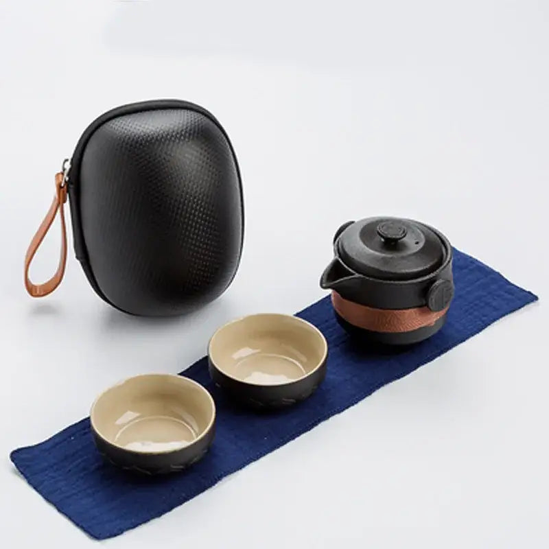 Floral embossed black pottery tea set with travel bag dining room