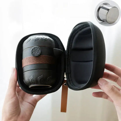 Floral embossed black pottery tea set with travel bag dining room