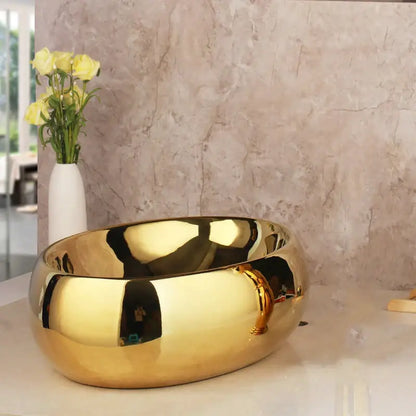 Floral embossed golden ceramic washbasin and brass mixer faucet bathroom set