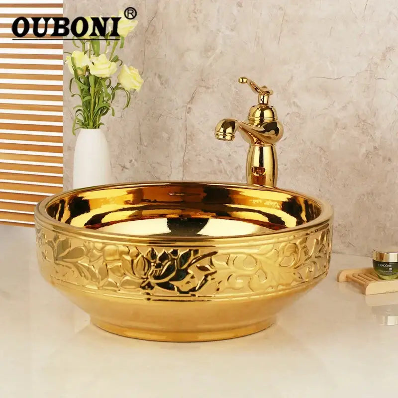 Floral embossed golden ceramic washbasin and brass mixer faucet bathroom set