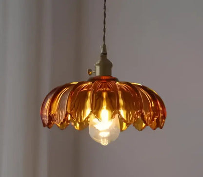 Floral green glass pendant lights for living room in golden brass