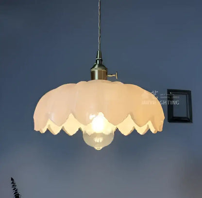 Floral green glass pendant lights for living room in golden brass