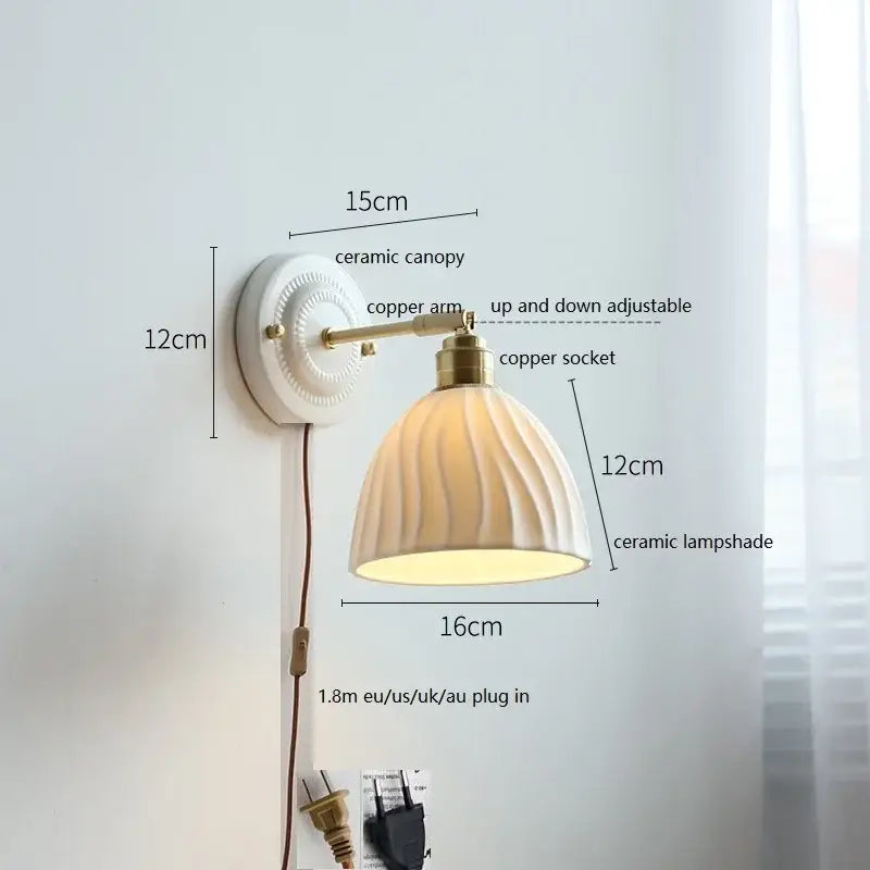 Fluted cream ceramic wall lamp with brass accents – bathroom light