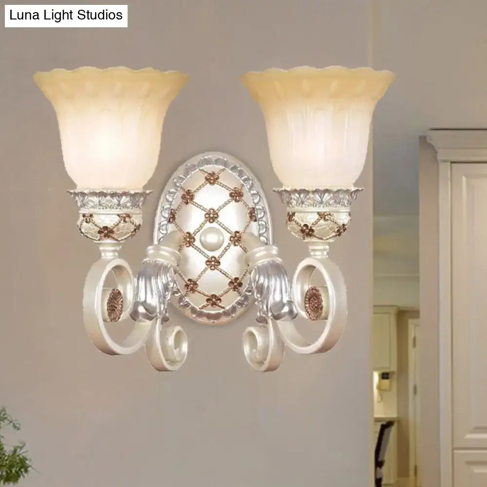 French country gold wall sconce with opaline glass – living room