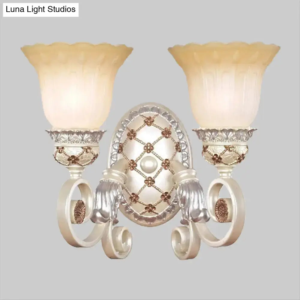 French country gold wall sconce with opaline glass – living room