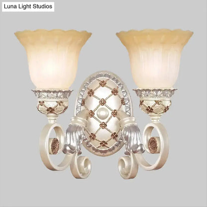 French country gold wall sconce with opaline glass – living room