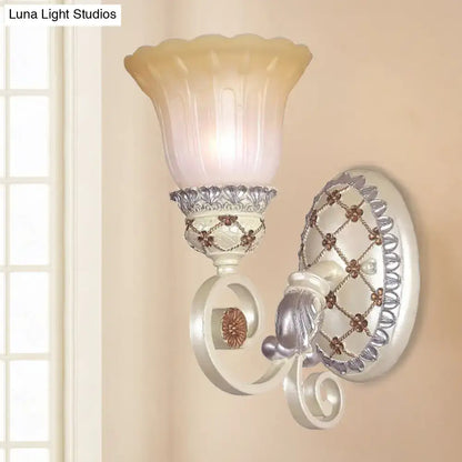 French country gold wall sconce with opaline glass – living room