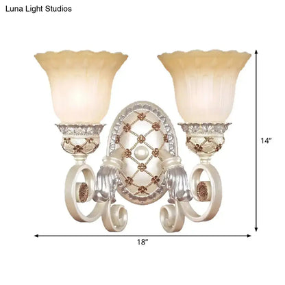 French country gold wall sconce with opaline glass – living room