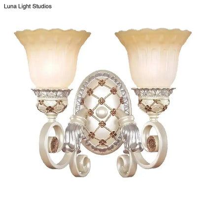 French country gold wall sconce with opaline glass – living room