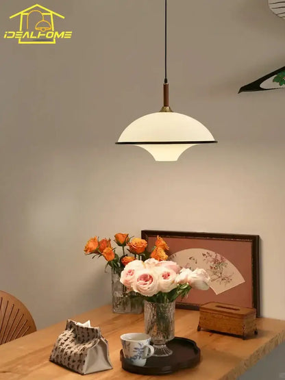 French medieval saucer cream and brass pendant light dining room