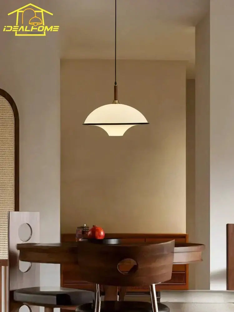 French medieval saucer cream and brass pendant light dining room