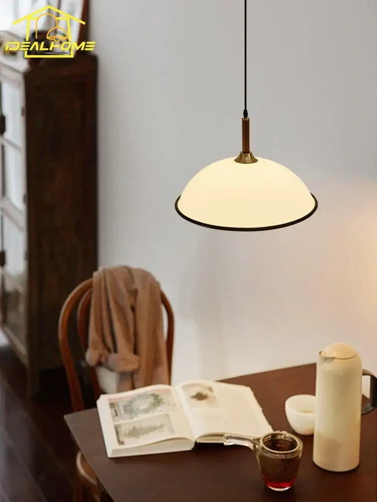 French medieval saucer cream and brass pendant light dining room
