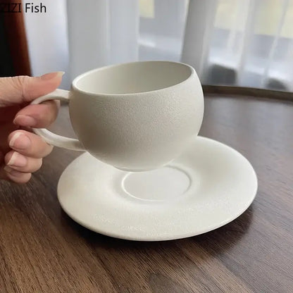 Frosted white textured ceramic cup and saucer set dining room