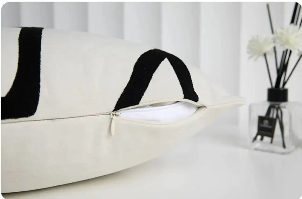 Geometric line embroidered pillowcase in black & white – living room