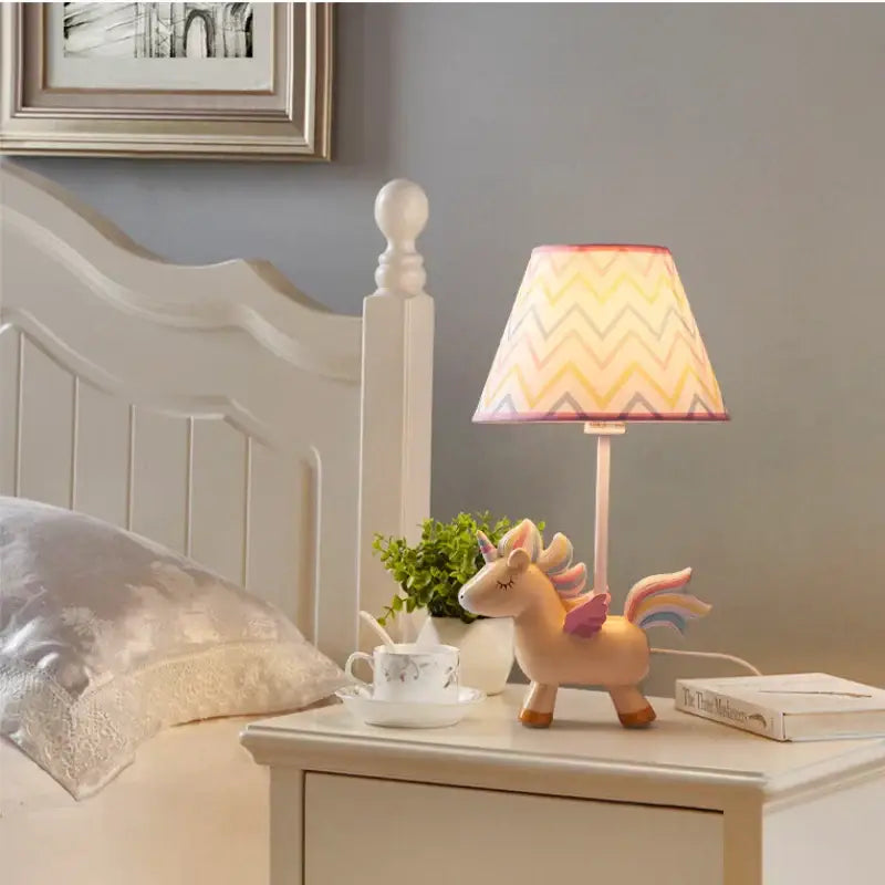 Geometric pink & blue unicorn table lamp for children’s bedroom