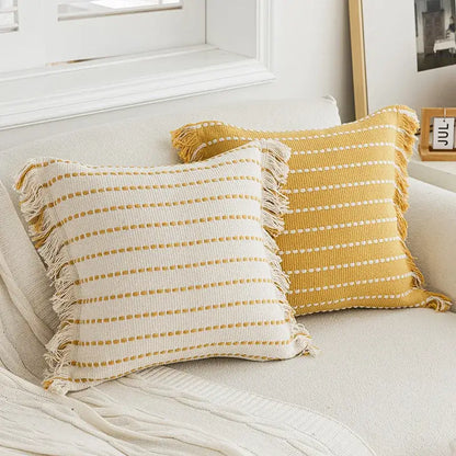Geometric tufted yellow cushion cover with crochet tassels living room
