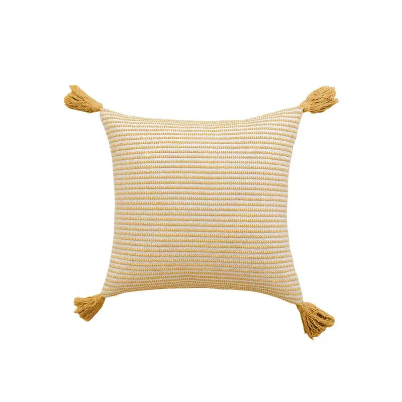 Geometric tufted yellow cushion cover with crochet tassels living room
