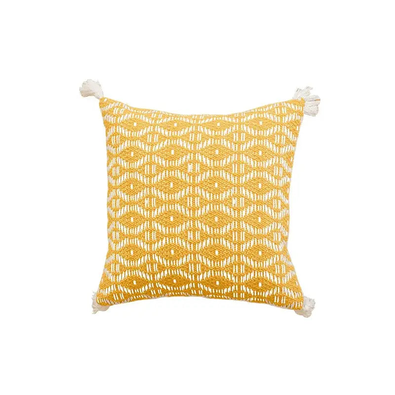 Geometric tufted yellow cushion cover with crochet tassels living room