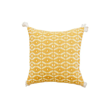 Geometric tufted yellow cushion cover with crochet tassels living room