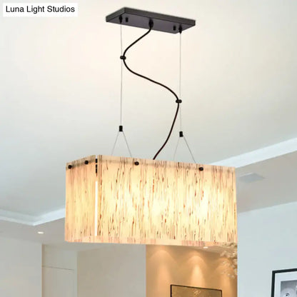 Modern bamboo and black glass island pendant light dining room