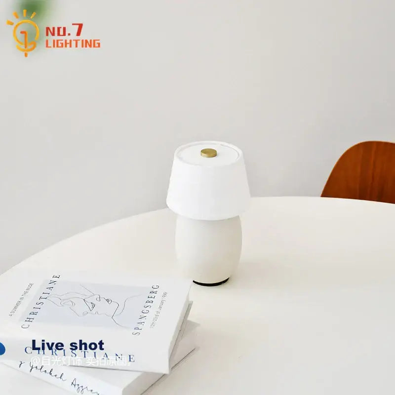 Glossy black ceramics table lamp with white shade for bedroom