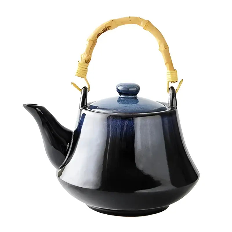 Glossy blue ceramic tea kettle set with bamboo handle dining room