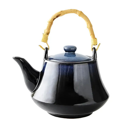 Glossy blue ceramic tea kettle set with bamboo handle dining room