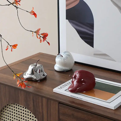 Glossy red abstract melting apple ceramic sculpture living room decor