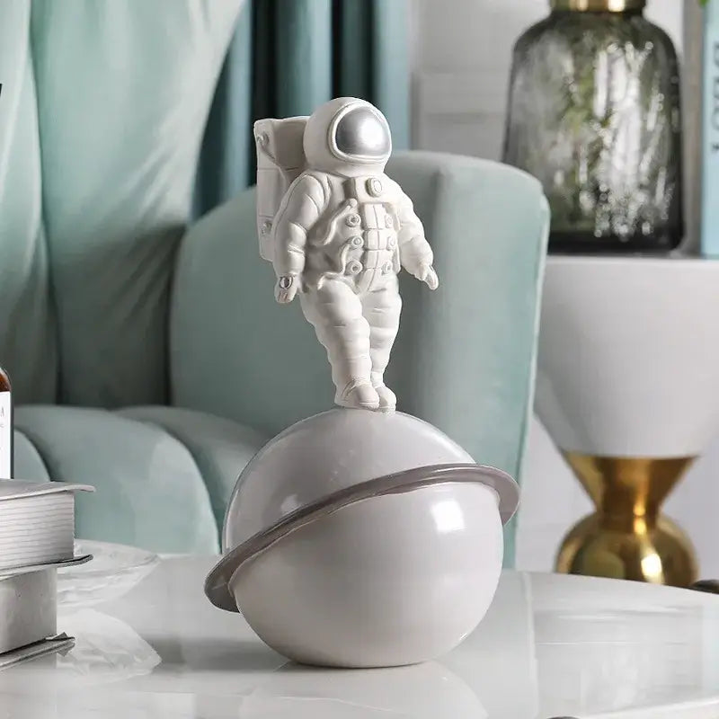 Glossy white and gold astronaut phone holder bedroom decor sculpture