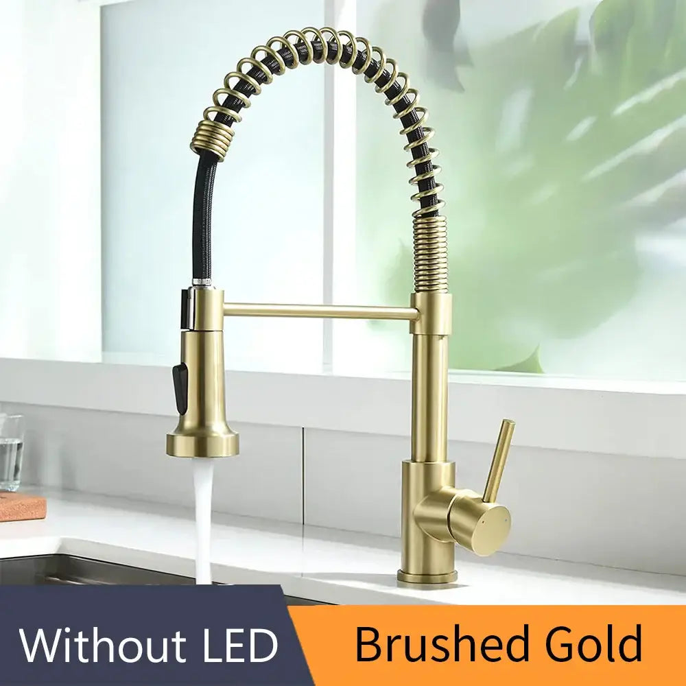 Gold brass spring spout kitchen faucet with pull down spray head