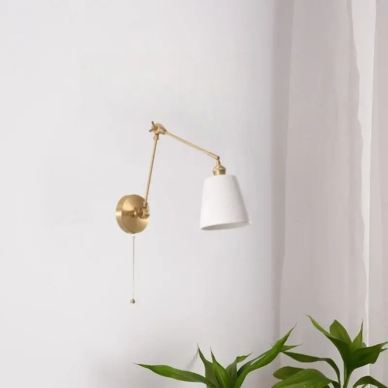 Gold ceramic led wall lamp with ribbed fabric shade for living room