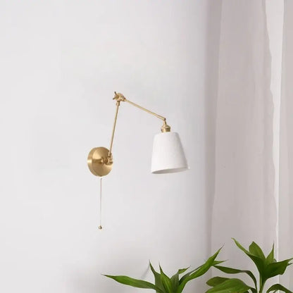 Gold ceramic led wall lamp with ribbed fabric shade for living room