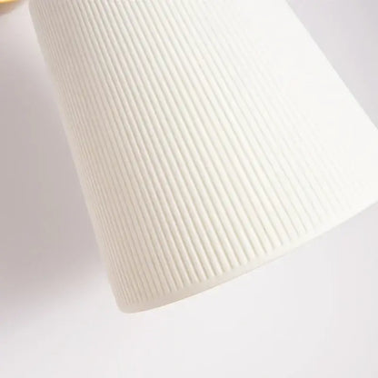 Gold ceramic led wall lamp with ribbed fabric shade for living room