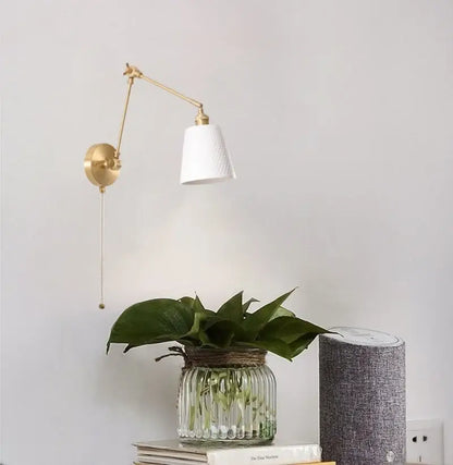 Gold ceramic led wall lamp with ribbed fabric shade for living room