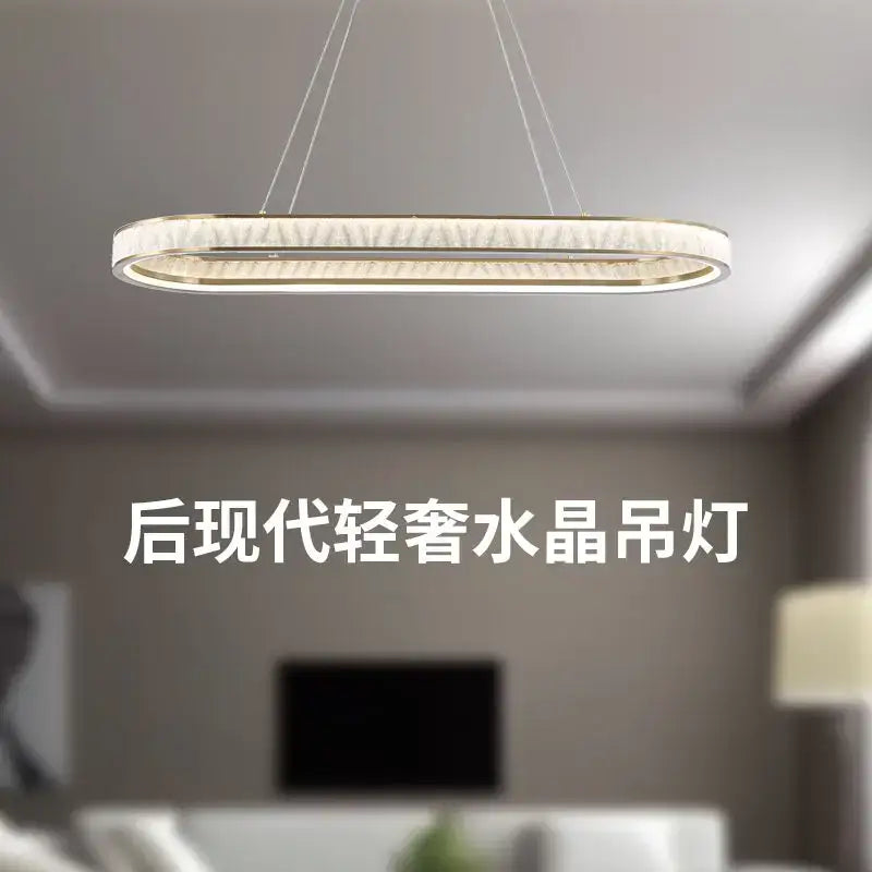 Gold crystal oval pendant chandelier for dining room textured glass
