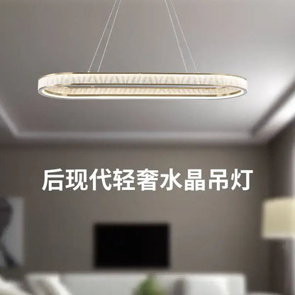 Gold crystal oval pendant chandelier for dining room textured glass