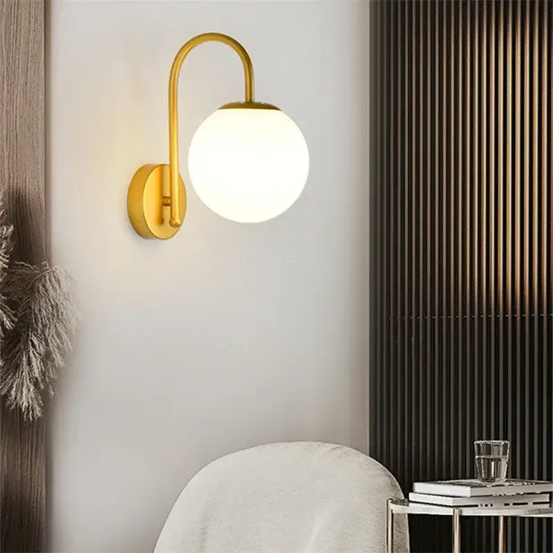 Gold curved arm glass ball led wall sconce bedroom light