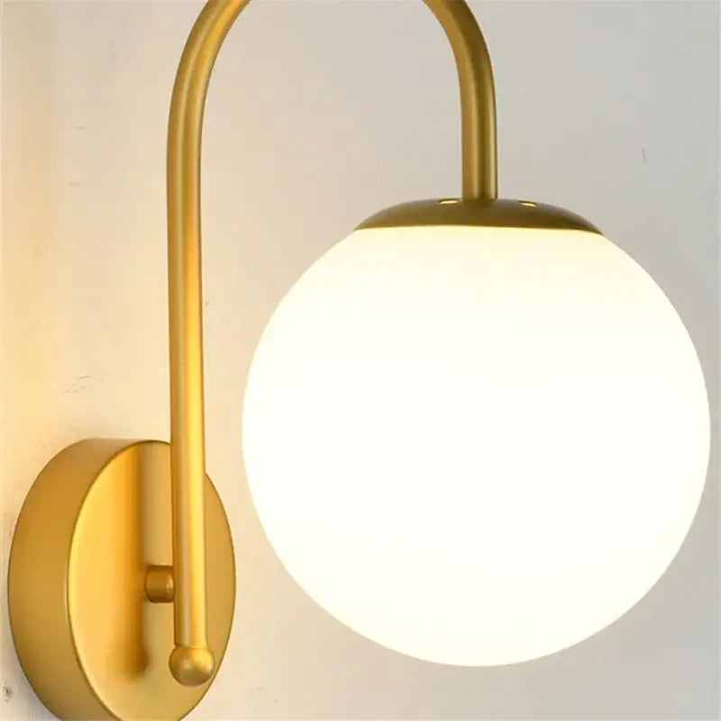 Gold curved arm glass ball led wall sconce bedroom light