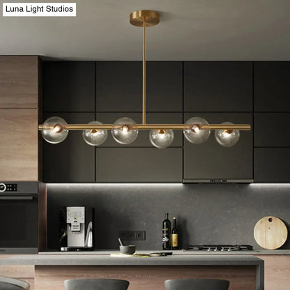DecorBites™ Gold Linear Island Pendant Light with Spherical Glass Shade - Perfect for Dining Table and Minimalist Decor